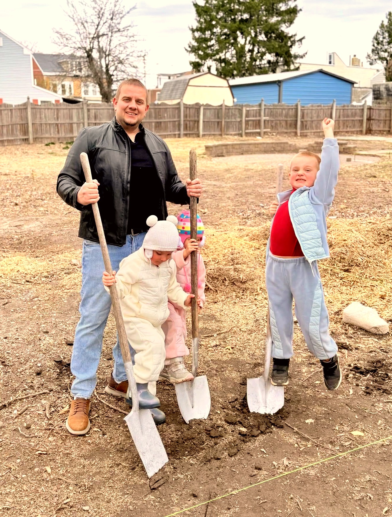 Prime Builders groundbreaking — family with shovels in Trenton, NJ